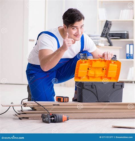 Young Worker Working on Floor Laminate Tiles Stock Image - Image of ...