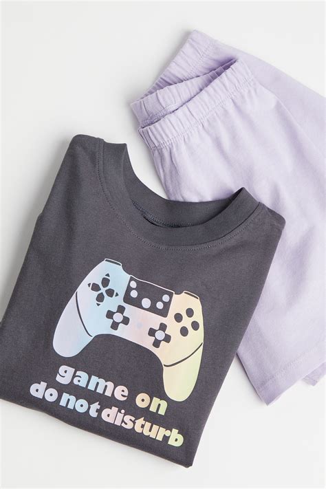 Printed jersey pyjamas - Dark grey/Game On - Kids | H&M IN
