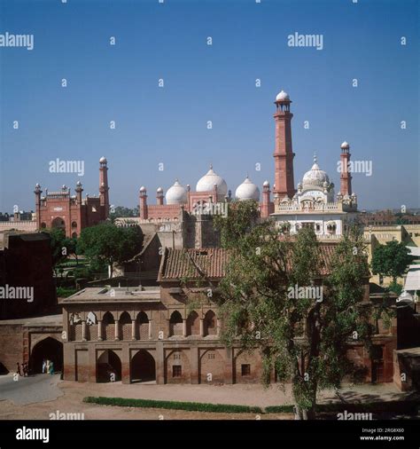 A view of Lahore with the BADSHAHI MOSQUE, one of the largest mosques in the world, built by ...
