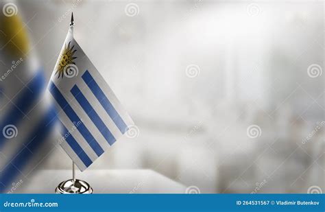 Small Flags of the Uruguay on an Abstract Blurry Background Stock Image - Image of flag ...