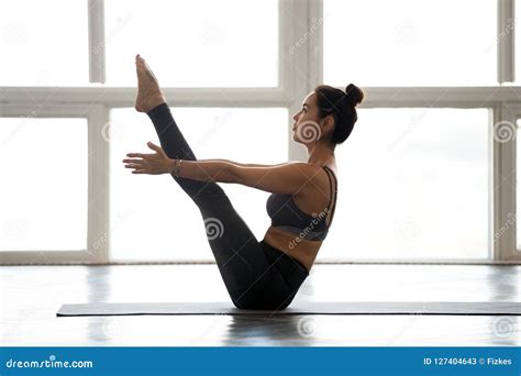 Young Yogi Woman Practicing Yoga, Navasana, Boat Pose Stock Image ...