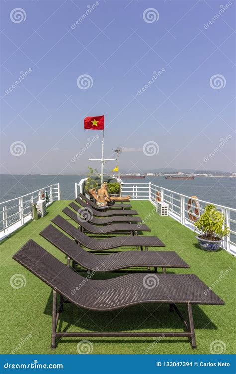 Tourists Sunbathing in Boat Rooftop at Ha Long Bay Descending Dragon ...