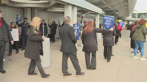 Flight attendants rally for new contract at Hopkins Airport | wkyc.com
