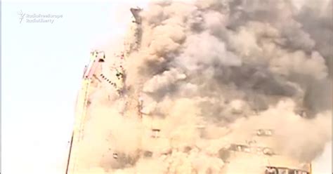 Dozens Injured As Blazing Building Collapses In Tehran