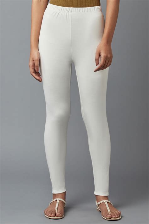 Buy Elleven Women's White Solid Skinny Fit Cotton Tights With ...