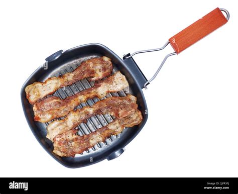 Grill Frying pan with cooked bacon rashers on white background Stock ...