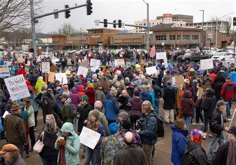 Photos: Protestors 'push back' against Musk, Trump on Presidents Day