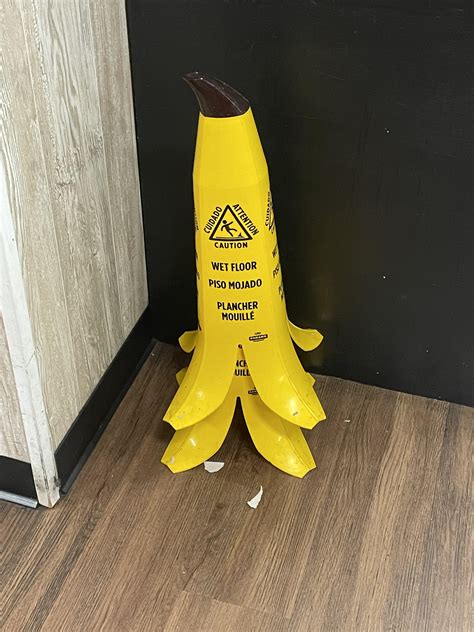 These wet floor signs that look like banana peels : r/mildlyinteresting