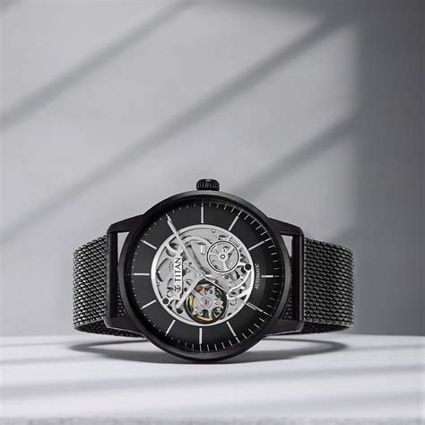 Buy Online Titan Skeletal Automatic Black Dial Black Stainless Steel ...
