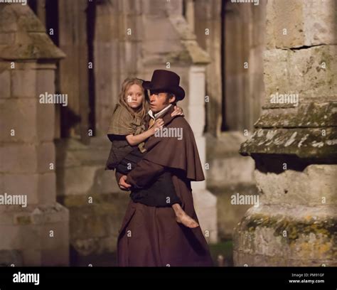ISABELLE ALLEN as young Cosette and HUGH JACKMAN as Jean Valjean in ...