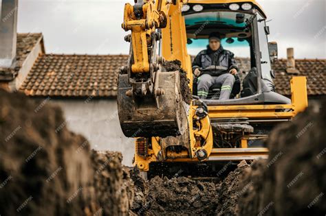 Image result for Backhoe Digging Hole