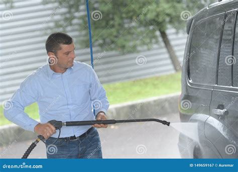 Carwash - Man Working with High Pressure Washer Stock Image - Image of summer, hose: 149659167
