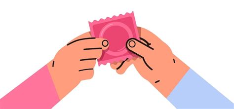 Human hands holding condoms sexual health education contraceptive ...