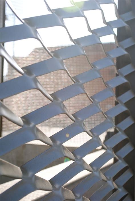 Image result for Blue Metal Mesh Cladding