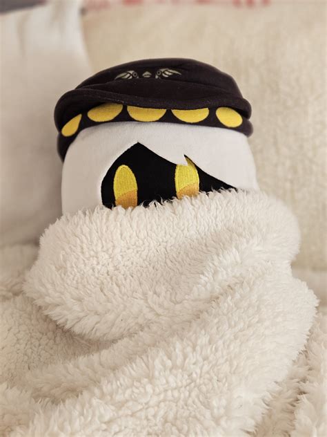 bundled up for winter (it is 57 degrees outside help it feels like ...