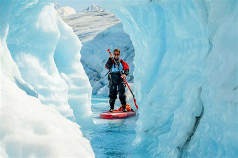 Knik Glacier Paddle Boarding In Alaska - Outbound Heli Adventures