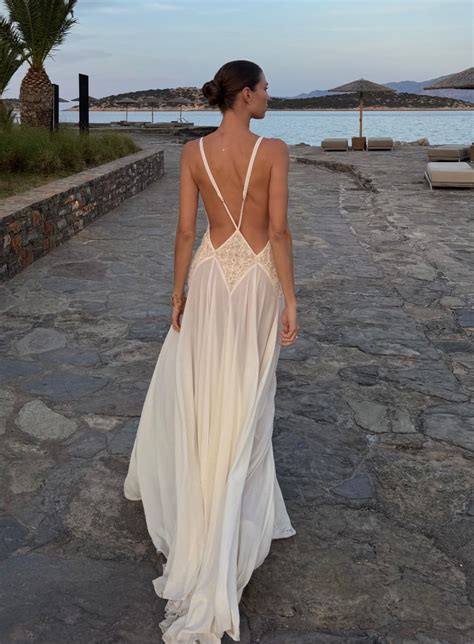 Pin by yu on dress in 2025 | Beach white dress, Wedding dress inspiration, Flowy summer dresses
