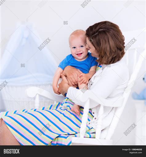 Young Mother Holding Image & Photo (Free Trial) | Bigstock