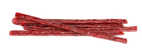 Dry salmon sticks isolated on white background. dried fish snacks for ...