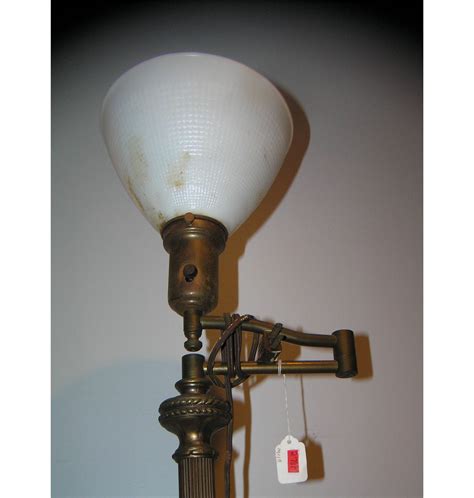 Antique floor lamp with milk glass shade