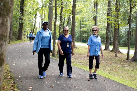 Couple Walking In Park
