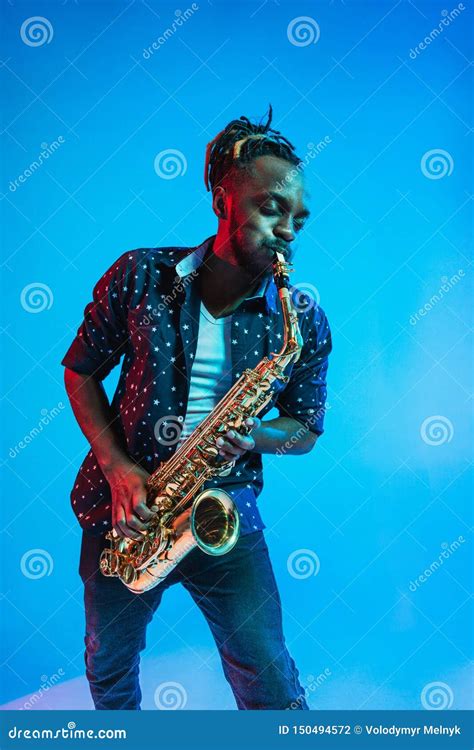 Young African-american Jazz Musician Playing the Saxophone Stock Photo ...