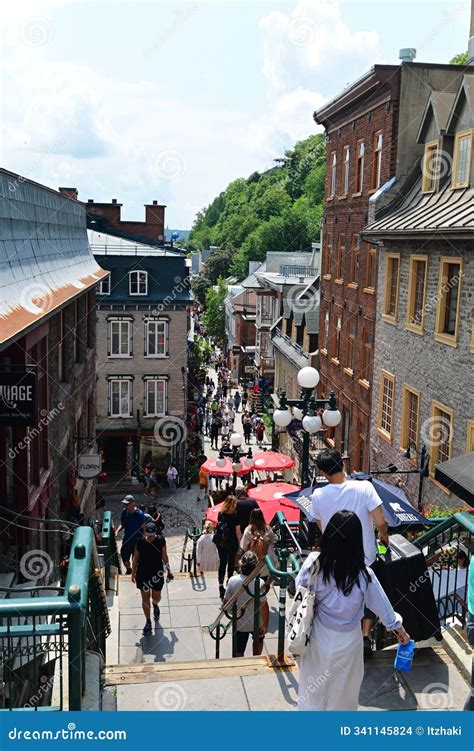 Pepole Wolking in the Streets of Historic Quebec City are in the Walled Section of the Capital ...