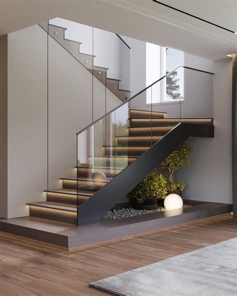 Modern Staircase Design with Glass Railing and Wood Flooring
