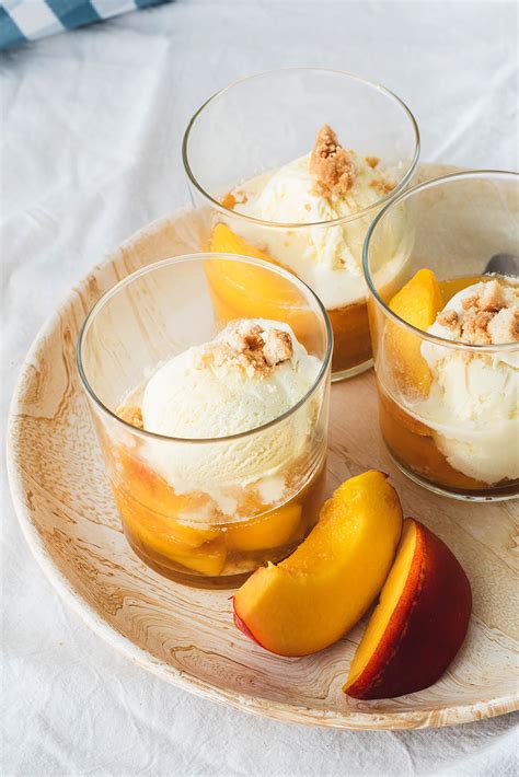 Wine peaches with ice cream