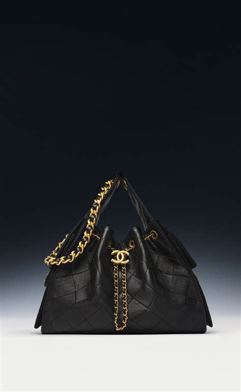 Chanel 25 large handbag, Grained calfskin & gold-tone metal, black ...