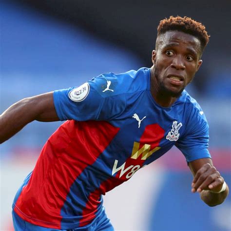 Download Wilfried Zaha Running During Game Wallpaper | Wallpapers.com