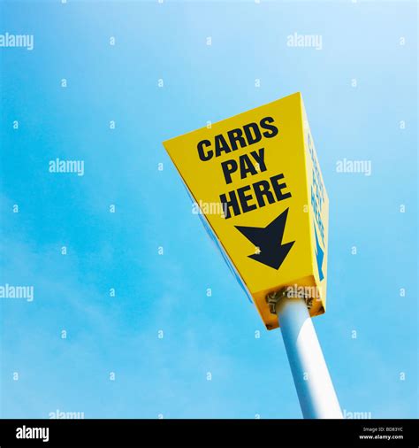 Credit Card Payment Sign and Blue Sky Stock Photo - Alamy