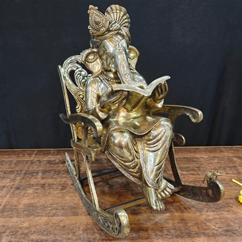 Brass Ganesha Statue Reading Book On Rocking Chair 2 Feet – StatueStudio