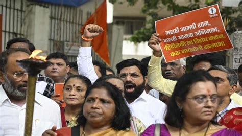 IN PHOTOS Uddhav Thackeray and son Aaditya join UBT members in burning ...