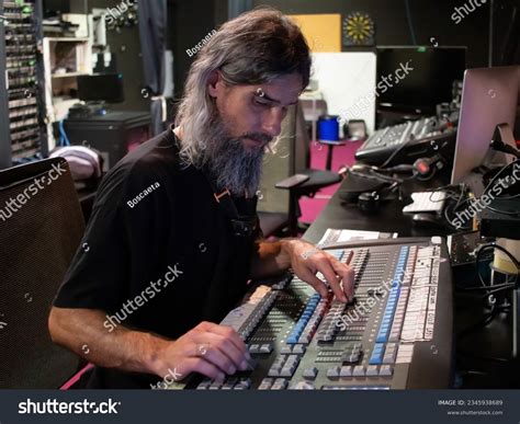 Lighting Technician On Theatre Control Desk Stock Photo 2345938689 ...