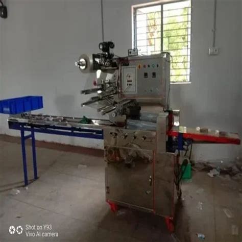 Packaging Machines - Peanut Chikki Packing Machine Manufacturer from ...