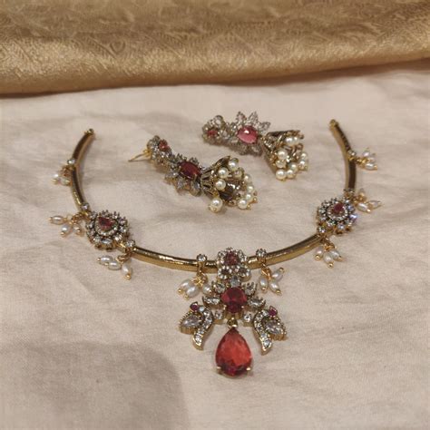Whimisical Ruby AD Stone Floral Pipe Necklace – Emporia Jewels