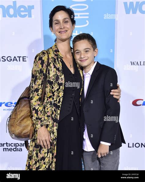 Carrie-Anne Moss and Jaden Roy attending the premiere of Wonder in ...