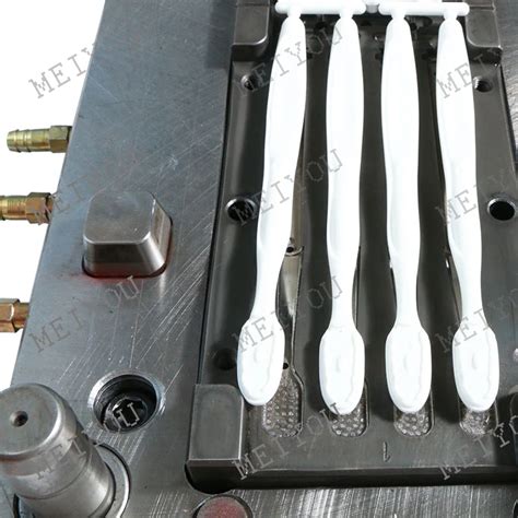 Image result for Toothbrush Molding Machine