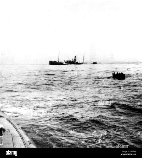 Steamer sinking after being attacked by a German submarine . Note the ...
