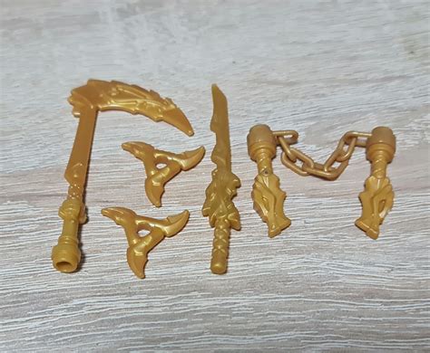 Goldene Ninjago Waffen