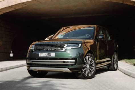 Rent Land Rover Range Rover HSE Green in Dubai - SUV - Octane.Rent