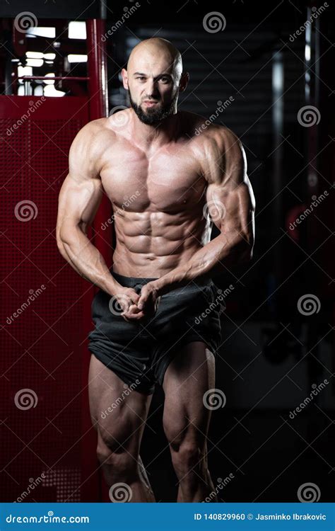 Bodybuilder Performing Most Muscular Pose Stock Photo - Image of adult ...