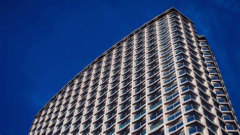 Download wallpaper 1920x1080 building, facade, windows, sky, blue full ...