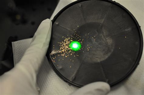 Microstructures fold under a beam of light to make useful 3-D devices ...