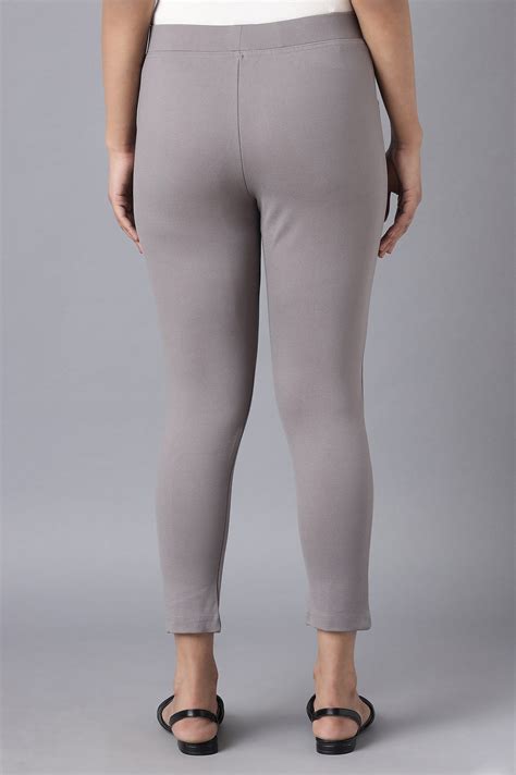 Buy Elleven Women's Grey Solid Straight Fit Yoga Tights With ...