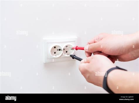 Image result for Using Multimeter to Trst Lamp Socket