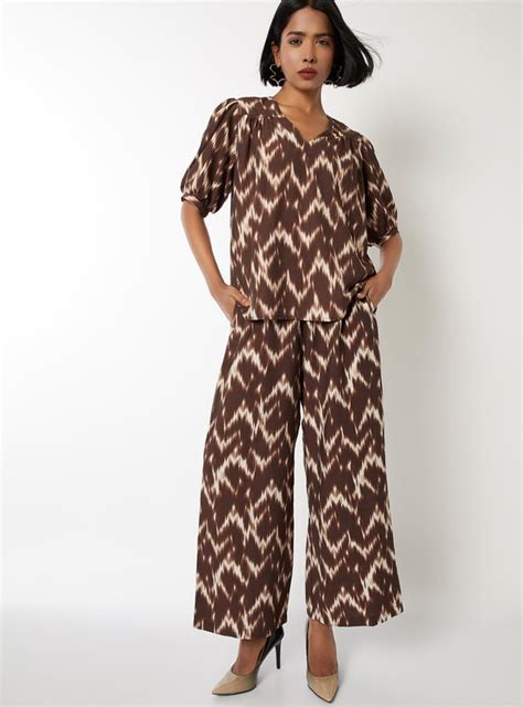 Buy Women Printed Puffed Sleeve Top Online at just Rs. 499.0 ...