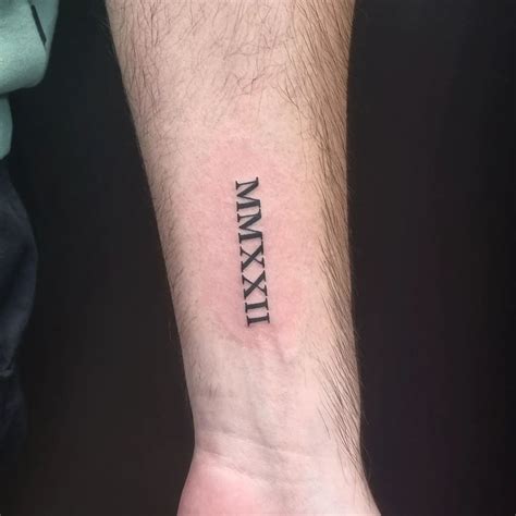 Roman Numeral Tattoos On Shoulder