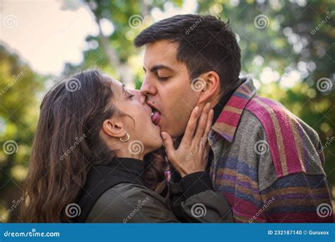 Close-up of French Kiss. Couple in Love Hugging and Kissing Stock Photo ...